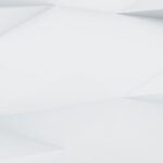 Fond abstrait blanc avec des formes géométriques angulaires et des ombres douces.