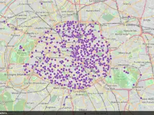 Une carte de Paris montre de nombreux points violets indiquant la localisation de toilettes publiques.